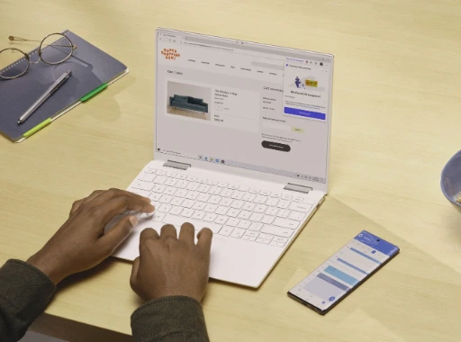 Digital marketing campaign tracking on laptop and mobile with analytics dashboard